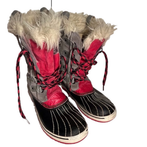 Sorel lace up fur trimmed fuchsia winter boots.
